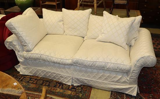 A contemporary upholstered two seater settee by Highly Sprung, length 220cm (See also Lot 56)